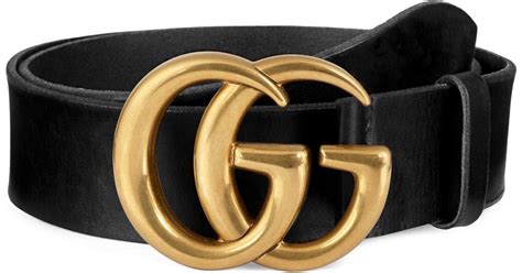 gold and black gucci belt